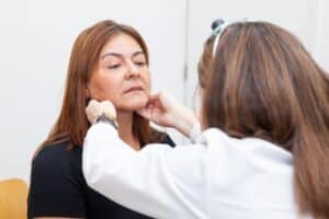 A doctor providing direct primary care to a patient in Lone Tree
