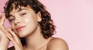 Woman shows off glowing skin after AquaFirme XS treatment